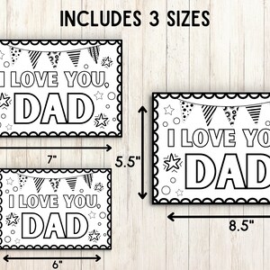 May include: Three black and white printable Father's Day cards with the text "I Love You, Dad" and a banner of flags. The cards are available in three sizes: 5.5 inches by 8.5 inches, 4 inches by 6 inches, and 5 inches by 7 inches.