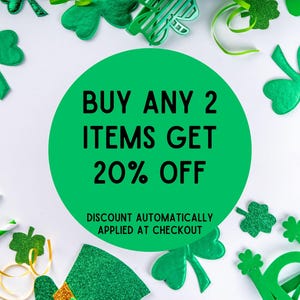 May include: Green shamrock decorations on a white background with a green circle that says "BUY ANY 2 ITEMS GET 20% OFF" and "DISCOUNT AUTOMATICALLY APPLIED AT CHECKOUT".