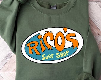Camiseta con el logo de Rico's Surf Shop, sudadera retro estilo años 90 con estampado de dibujos animados, camiseta nostálgica para millennials y la generación Z.