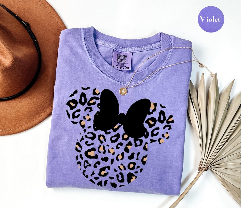 May include: A set of three ceramic mugs with a speckled, matte finish. The mugs are in shades of cream, light gray, and dark gray. Each mug has a simple, minimalist design, perfect for coffee or tea.