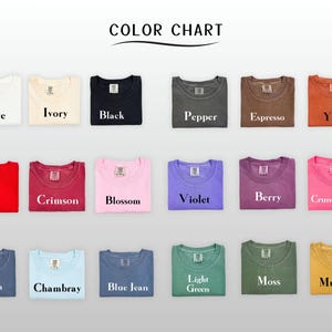 May include: Color chart featuring folded t-shirts in various colors, including white, black, red, and blue. The chart displays the names of the colors, such as "Ivory," "Pepper," "Berry," and "Mustard."
