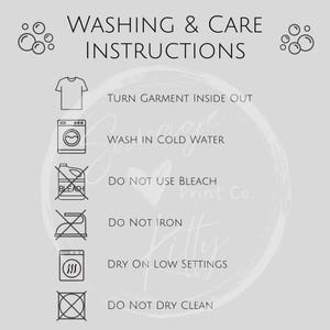 May include: A light gray graphic with washing and care instructions. The text includes "WASHING & CARE INSTRUCTIONS", "TURN GARMENT INSIDE OUT", "WASH IN COLD WATER", "DO NOT USE BLEACH", "DO NOT IRON", "DRY ON LOW SETTINGS", and "DO NOT DRY CLEAN".
