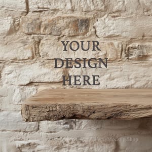 May include: A rustic wooden shelf with a rough, natural edge, set against a backdrop of a white brick wall. The text "YOUR DESIGN HERE" is superimposed on the wall.