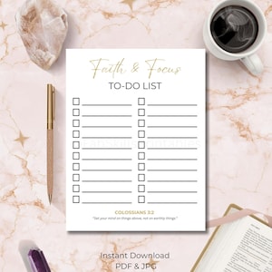 May include: A white to-do list titled "Faith & Focus" with checkboxes and lines. The text "Colossians 3:2" and a quote are at the bottom. A gold pen, a cup of coffee, and a book are also visible.