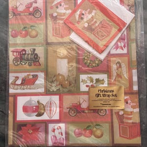May include: Christmas gift wrap set with a variety of festive illustrations, including a red antique car, a train, and a sleigh. The set includes gift wrap sheets, coordinated cards, and envelopes. The overall color scheme is red, green, and gold.