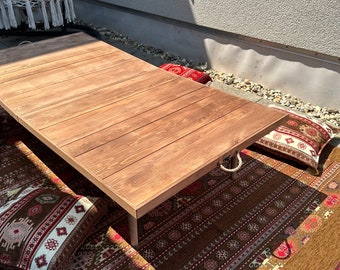 Handcrafted bohemian style picnic table for events and celebrations