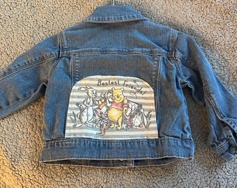 Spijkerjas met Winnie the Pooh op de achterkant