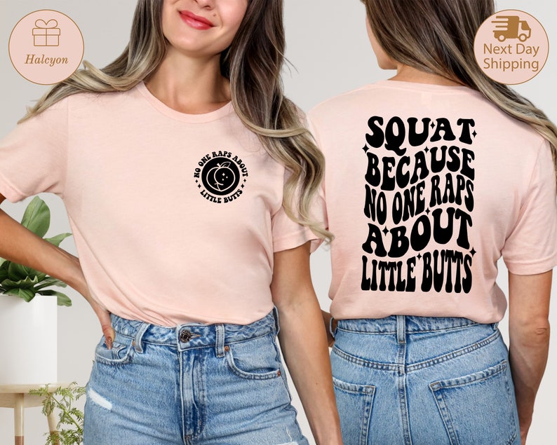 May include: Pink t-shirt with a peach graphic and the text "No one raps about little butts" on the front. The back of the shirt has the text "Squat because no one raps about little butts" in a retro font.