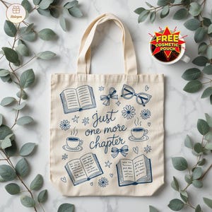 May include: Cream-colored tote bag with blue illustrations of books, bows, glasses, flowers, and coffee cups. The text "Just one more chapter" is featured on the bag. A free cosmetic pouch is included.