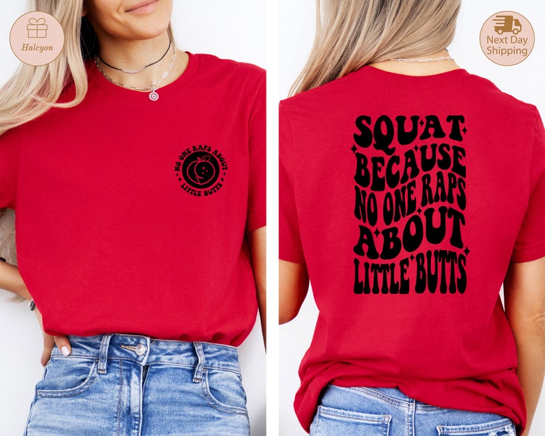 May include: Red t-shirt with a black graphic on the front that says "No one raps about little butts" and a black graphic on the back that says "Squat because no one raps about little butts".