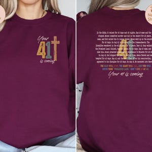 May include: Burgundy sweatshirt with a cross and the text "Your 41 is coming" on the front. The back of the sweatshirt has a quote about the number 41 in the Bible.