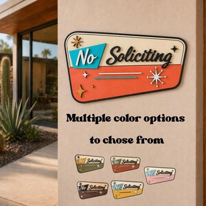 May include: A trapezoidal wall sign featuring the text No Soliciting in black script, set against a cream, teal, and orange background with starburst accents. Below, five smaller versions of the sign are displayed in various color combinations.