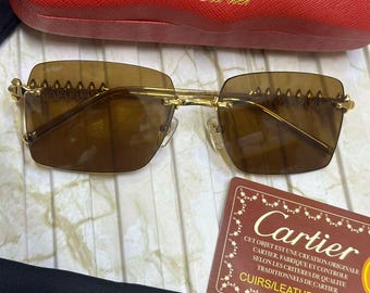 Vintage Cartier Rimless Sunglasses: Model CT0545S Brown Lens