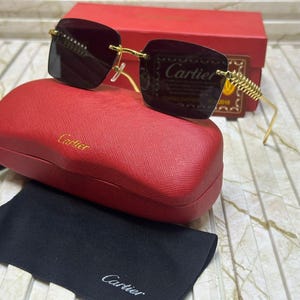 Cartier Women\'s Black Sunglasses with Red Case Cartier CT0474S Panthère de Cartier Unisex sunglasses  main image 3