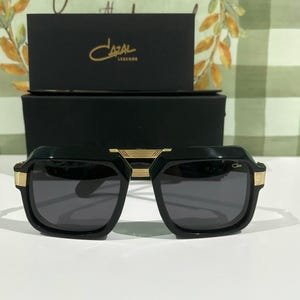 Gafas de sol CAZAL, modernas y modernas, con lentes oscuras, estilo vintage, modelo 669, montura cuadrada negra y dorada, regalo para el Día del Padre, para papá o mamá.