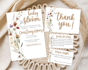 May include: Baby shower stationery set featuring floral illustrations. The invitation card says "baby in bloom" with event details. Other cards include "Thank you," "Books for baby," and "Diaper Raffle," all with floral accents.