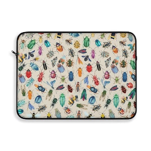 May include: A laptop sleeve with a beige background and a repeating pattern of colorful beetles and bugs.