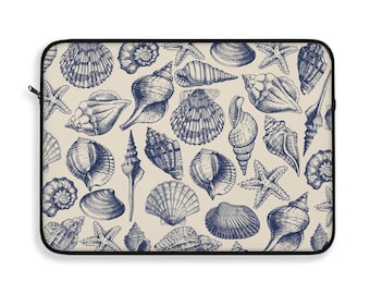 Funda para portátil con estampado de conchas marinas: funda protectora con cremallera y diseño costero.
