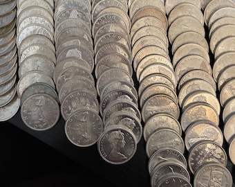 Authentic Canadian Silver Dollar Coins (one year per purchase)