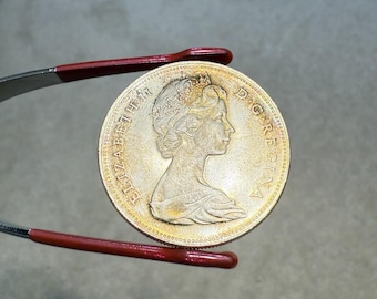 本物の1965年カナダ1ドル銀貨（大型ビーズ） - トーンジェム - Etsy 日本