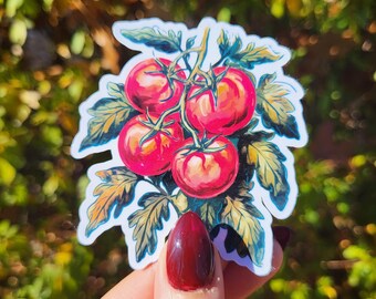 May include: A sticker featuring a watercolor illustration of red tomatoes on a vine with green leaves.