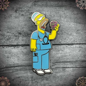 May include: A yellow cartoon character wearing a blue surgical scrub top and a white surgical cap is eating a pink and white doughnut. The character has a stethoscope around their neck and a pair of scissors in their pocket.