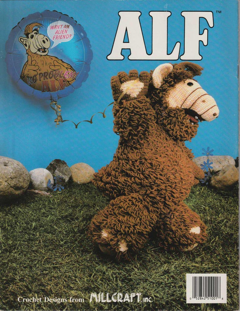 May include: A crochet pattern for a brown and white Alf puppet. The pattern is from Millcraft, Inc. The image shows the finished puppet with a blue background and a small balloon with Alf's face on it.