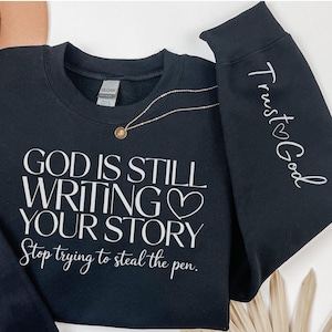 God Is Still Writing Your Story, Trust God Sleeve Sweatshirt, Faith-Based Sweater, Gift for Believers, Christian Crewneck, Religious Apparel