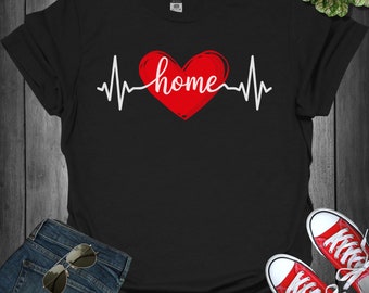 Hemma är där hjärtat är grafisk t-shirt, unisex bomullst-shirt