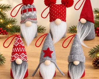 May include: A set of six decorative gnome ornaments featuring various hat designs, including red and gray knit patterns, solid red felt, and gray felt with star or snowflake embroidery. Each gnome has a round nose and a long white beard.