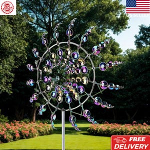 May include: A kinetic garden wind spinner featuring a circular metal frame with multiple rotating arms. Each arm is adorned with small, iridescent, circular discs that reflect purple, blue, and gold hues, creating a swirling visual effect.