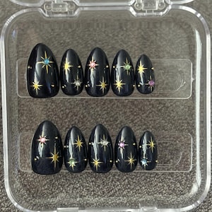 Handmade dark twinkle star nails