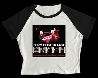 May include: White and black raglan crop top featuring a graphic from the band "From First to Last". The graphic includes the band's name and album art. The text "dear diary, my teen angst has a bodycount" is also visible.
