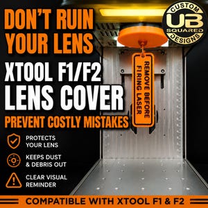 May include: An orange lens cover for Xtool F1/F2 laser engravers. The cover has the text "Remove Before Firing Laser" and is designed to prevent costly mistakes. The cover protects the lens, keeps dust and debris out, and provides a clear visual reminder.