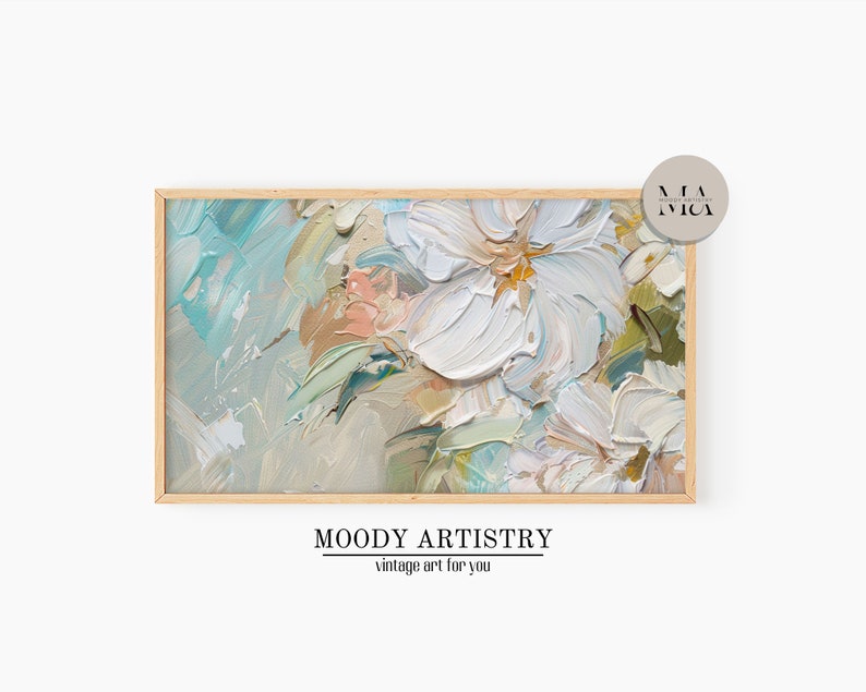 May include: A framed abstract painting with white flowers and a blue, green, and beige background. The painting is in a wooden frame.