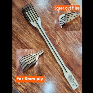 Puede incluir: Archivos de corte láser para una pala de madera con forma de caballito de mar con un diseño decorativo. La pala está hecha para madera contrachapada de 3 mm.