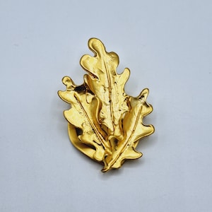 Anillo de bufanda de hoja con textura dorada