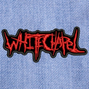 Peut inclure: Patch brodé rouge avec le nom du groupe "WHITECHAPEL" en contour noir.