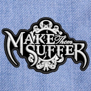 May include: Black and white embroidered patch with the text "MAKE Them SUFFER" in a gothic font. The patch features a clock face with ornate details.
