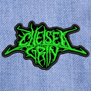 May include: Green embroidered patch with the words "Chelsea Grin" in a stylized font.