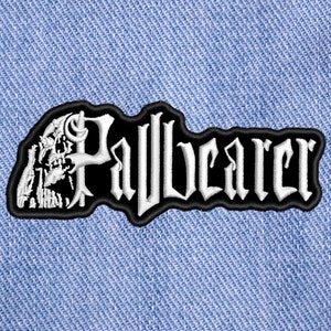 May include: Black and white embroidered patch with the word "Pallbearer" in white lettering and a skull design.