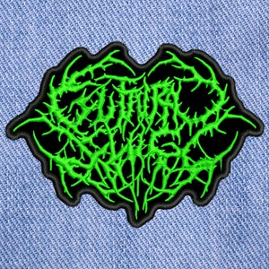 May include: Green embroidered patch with the text "SUFFOCATE" in a black gothic font.