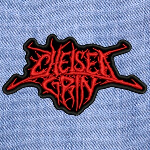 May include: Red embroidered patch with the words "Chelsea Grin" in a black outline. The patch is on a blue denim background.