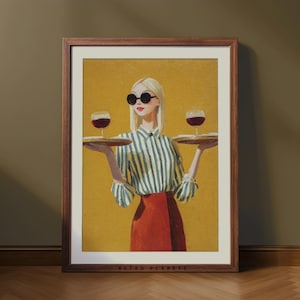 May include: Framed art print featuring a woman in sunglasses holding two trays with wine glasses. She wears a striped shirt, red skirt, and has blonde hair. The background is yellow, and the frame is brown. The text "RETRO PLANETS" is at the bottom.