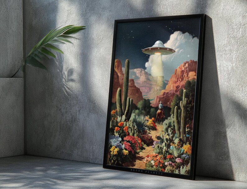 Flying saucer desert poster leaning on a concrete wall with cactus shadows, rustic-modern Western atmosphere.