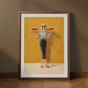May include: Framed art print featuring a woman in sunglasses holding a tray of wine glasses. She wears a striped shirt, dark skirt, and red heels. The background is a mustard yellow color. The frame is a dark brown color. The text "RETRO PLANETS" is at the bottom.