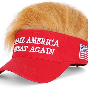 May include: A red visor featuring the white embroidered text MAKE AMERICA GREAT AGAIN on the front. The side of the visor displays a small embroidered American flag. Attached to the top of the visor is a thick layer of synthetic blonde hair.