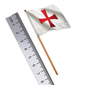May include: A white flag with a red cross, a symbol of the Knights Templar, is displayed on a wooden stick. A ruler is shown for scale.
