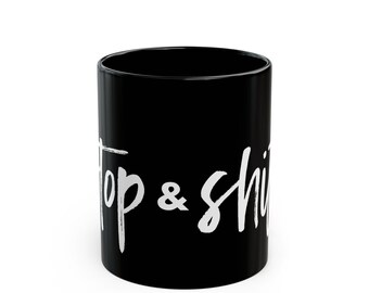 Taza de café negra Stop & Shift