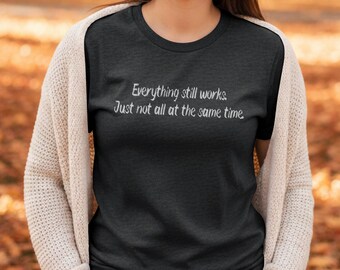 Everything Still Works Just Not All At Once Funny Aging Tshirt | Witty Getting Older Humor Tee | Gildan 64000